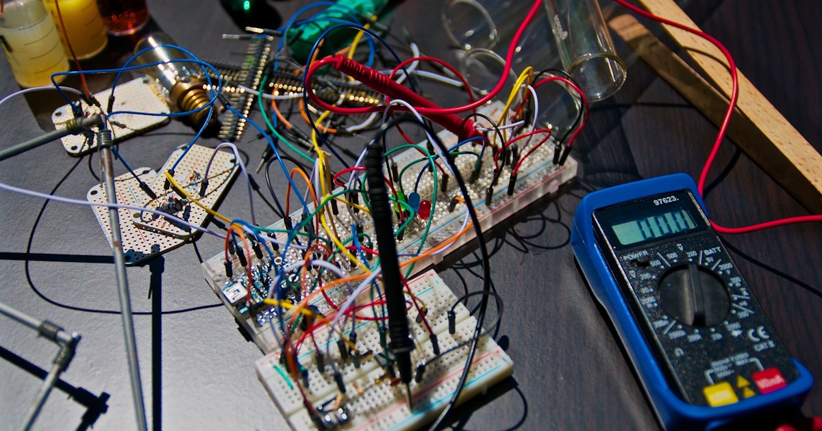 Electronic circuit boards beside a tester